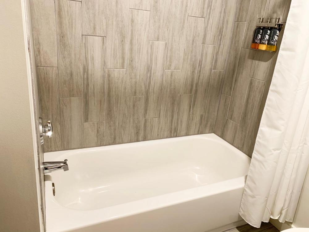 Queen Room with Two Queen Beds with Bath and Balcony interior